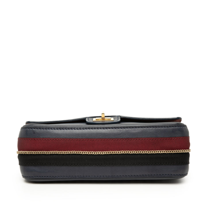 Chanel Cuir de veau Reissue 2.55 Medallion Double rabat 225