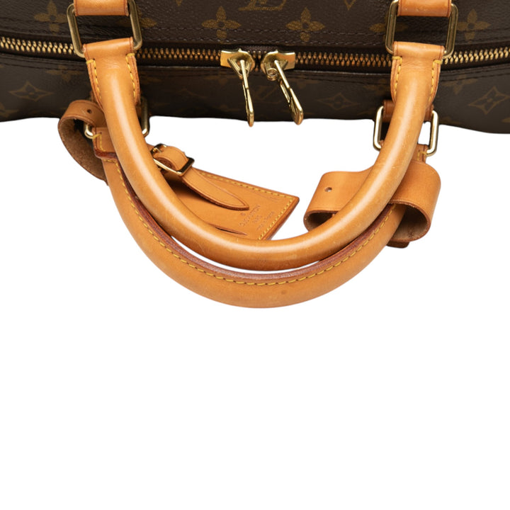 Louis Vuitton Keepall 60 Monogram Marron – vue 7 – GABY PARIS