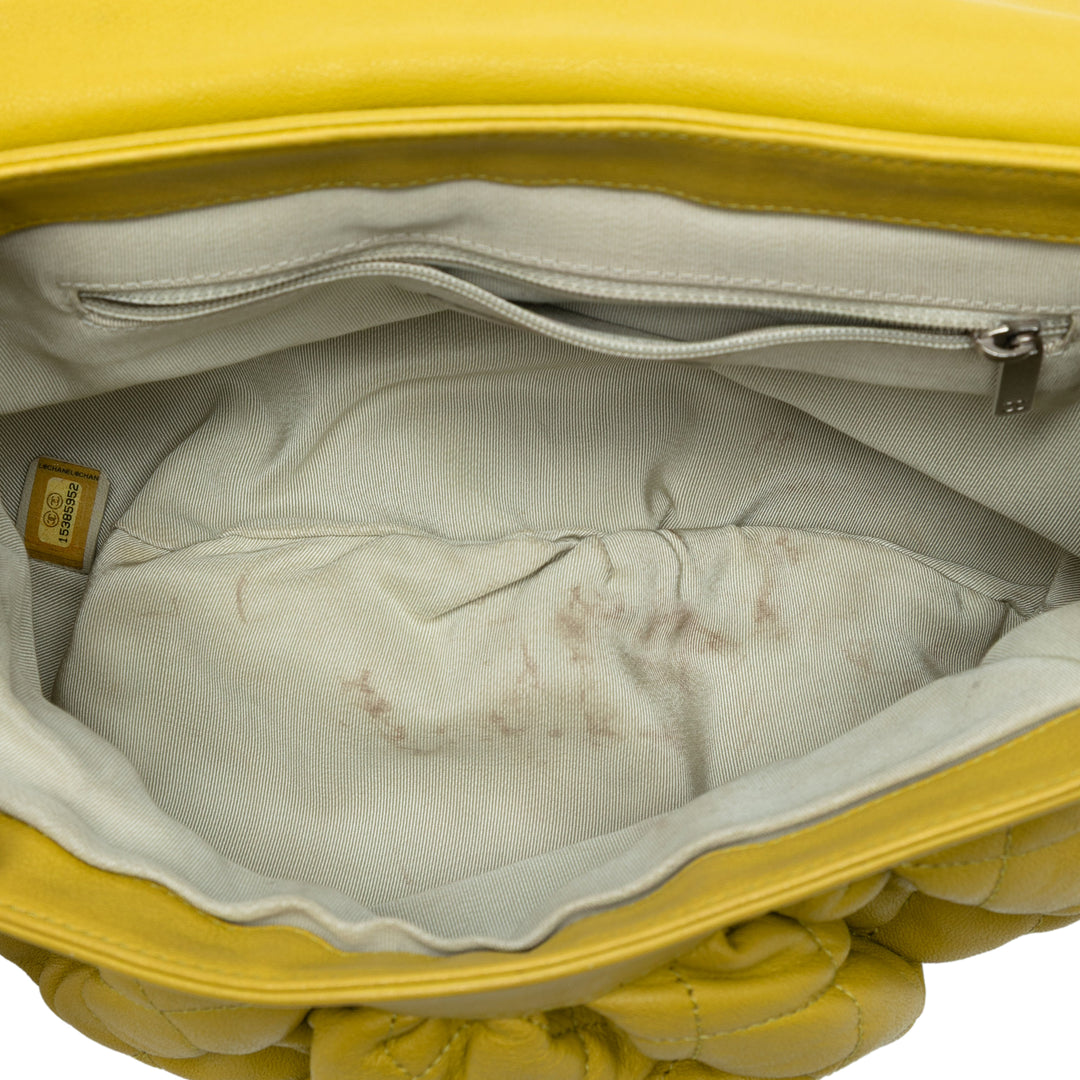 Chanel CC Matelassé Cuir d’agneau Sac rond à chaîne à rabat