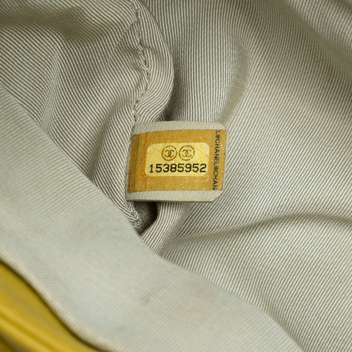 Chanel CC Matelassé Cuir d’agneau Sac rond à chaîne à rabat