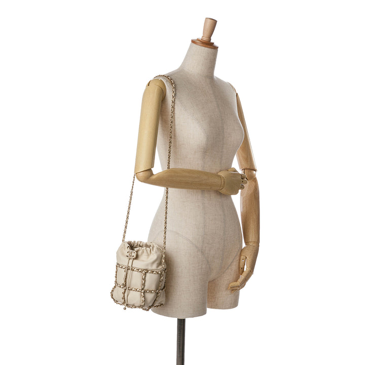 Lambskin CC Chain Frame Drawstring Bucket Bag White - Gaby Paris