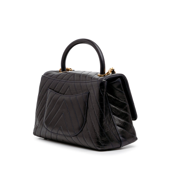 Medium Chevron Aged Calfskin Coco Top Handle Bag Black - Gaby Paris