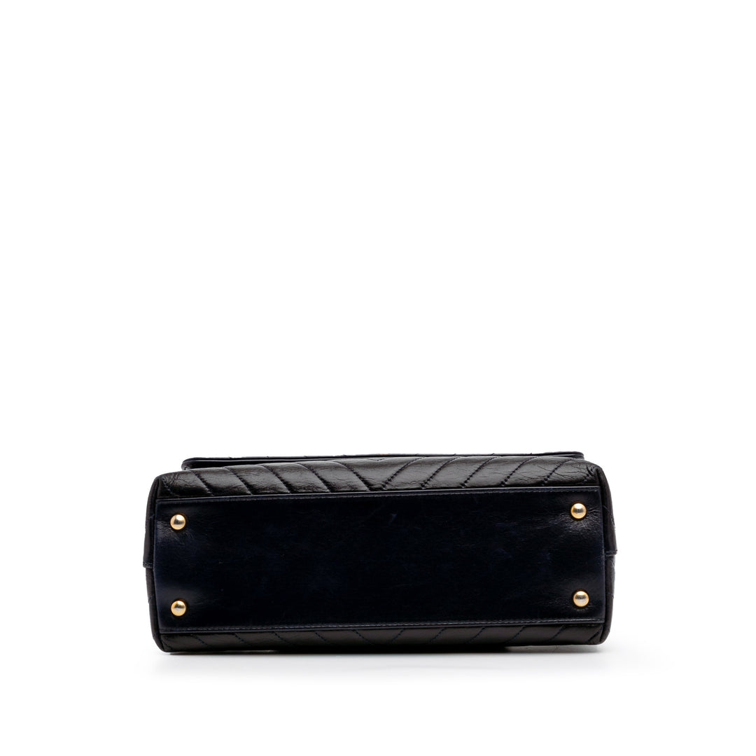 Medium Chevron Aged Calfskin Coco Top Handle Bag Black - Gaby Paris