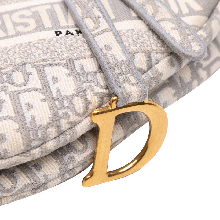 Oblique Canvas Embroidered Saddle Bag Gray - Gaby Paris
