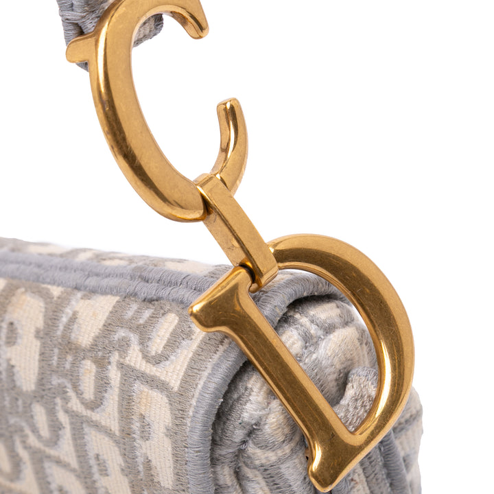 Oblique Canvas Embroidered Saddle Bag Gray - Gaby Paris