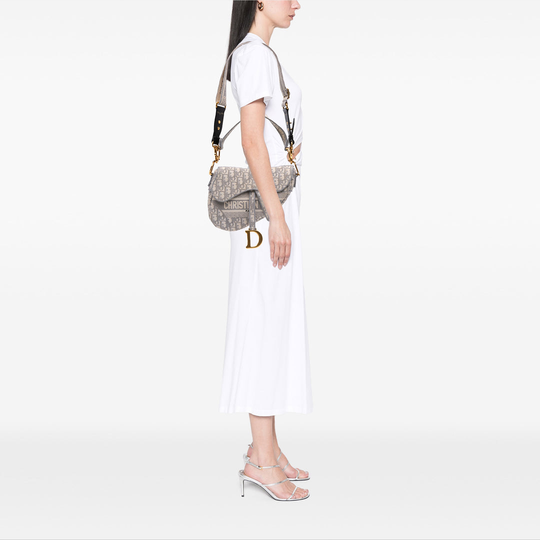 Oblique Canvas Embroidered Saddle Bag Gray - Gaby Paris