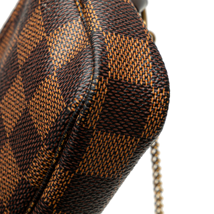 Damier Ebene Mini Pochette Accessoires Brown - Gaby Paris