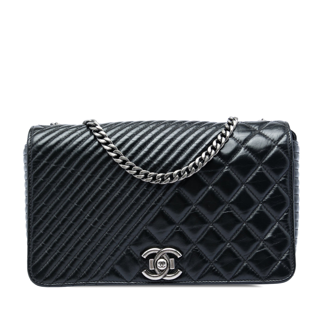 Chanel Matelassé vieilli Coco Boy à rabat Moyen Cuir de veau
