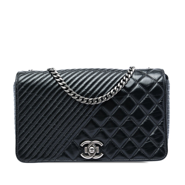 Chanel Matelassé vieilli Coco Boy à rabat Moyen Cuir de veau