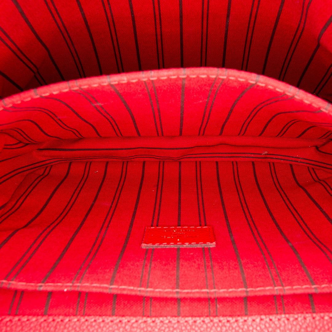 Louis Vuitton Pochette Métis Monogram Empreinte Rouge – vue 4 – GABY PARIS