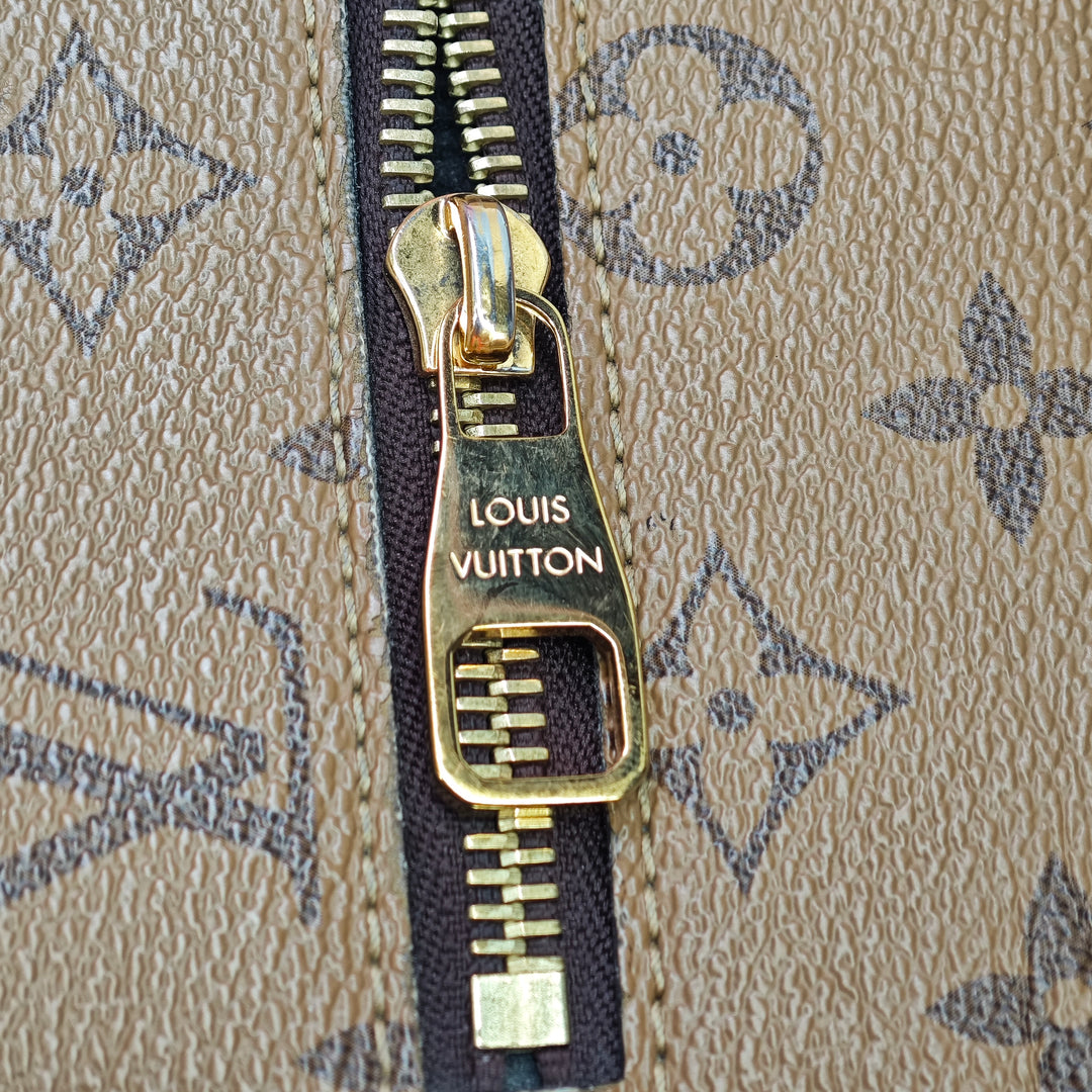 Louis Vuitton Monogram Reverse Pochette Metis