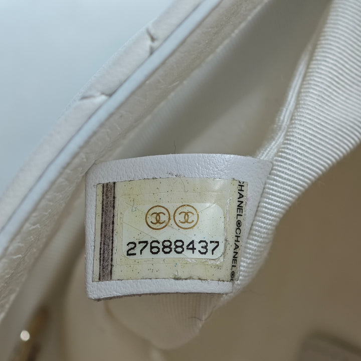 Chanel CC Matelassé Cuir d’agneau Side Packs à rabat