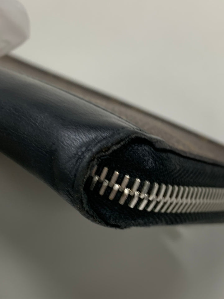 Louis Vuitton Monogram Macassar Vertical Zippy Portefeuille
