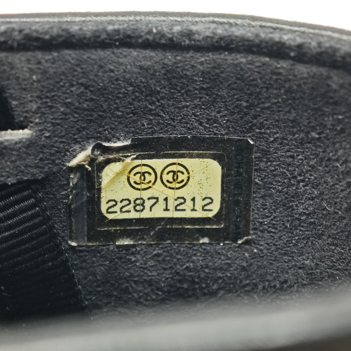 Chanel CC Matelassé Cuir d’agneau Sac rond à chaîne Phone Holder