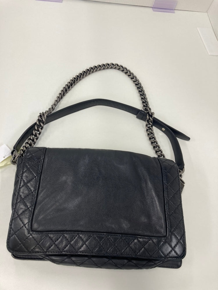 Chanel Medium Cuir de veau Boy Reverso à rabat