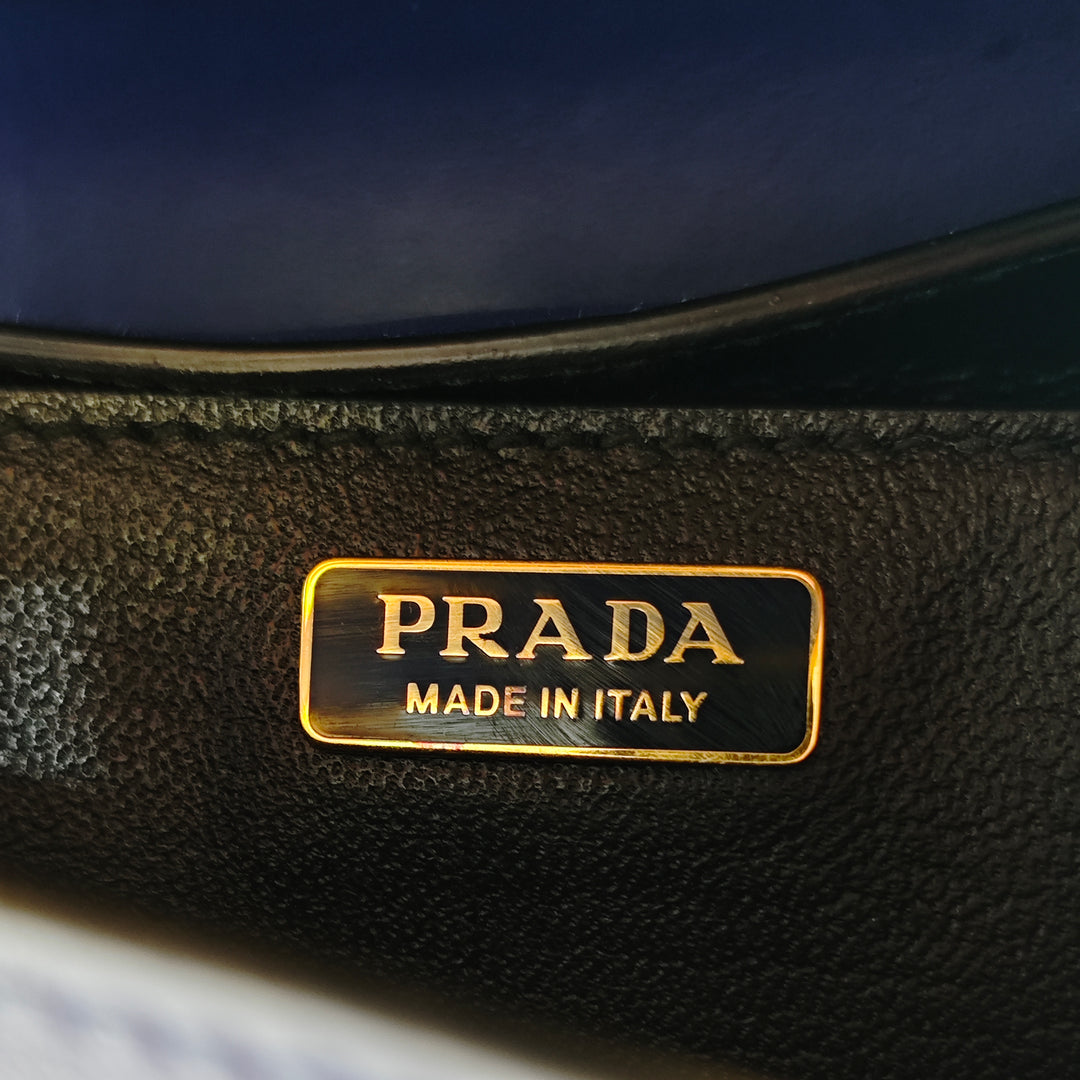 Prada Saffiano à finitions City Veau Cahier Sac porté croisé