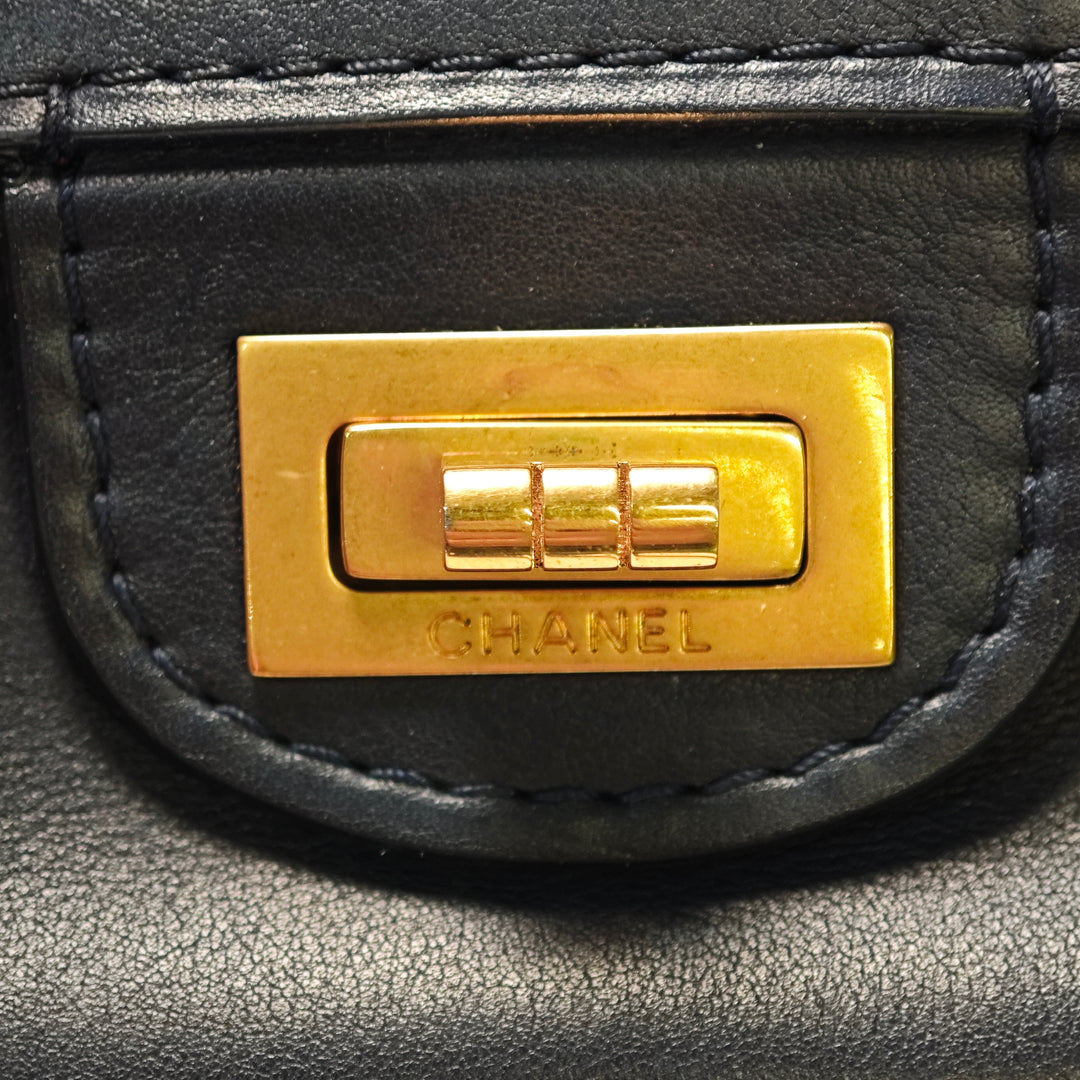 Chanel Cuir de veau Reissue 2.55 Medallion Double rabat 225