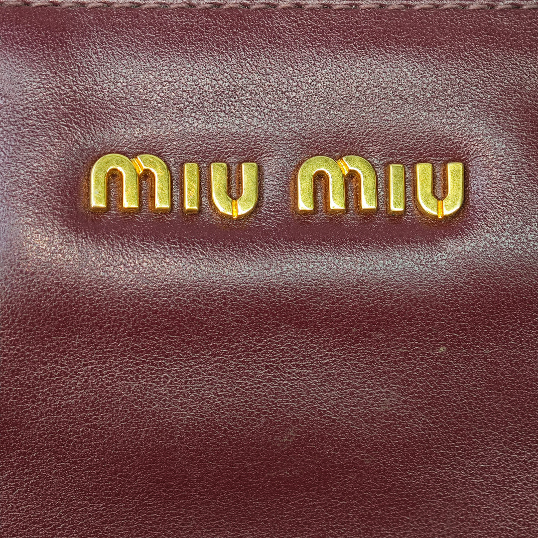 Miu Miu clouté Cuir Zip Pochette