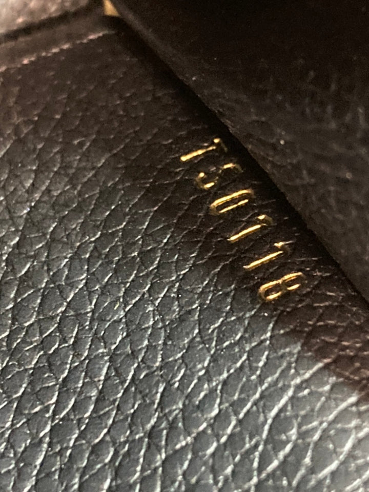 Louis Vuitton Monogram Empreinte Zippy Coin Pochette