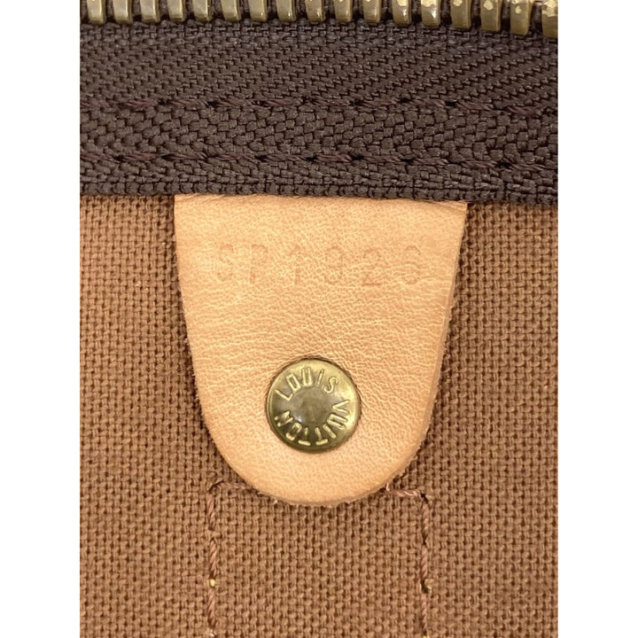 Louis Vuitton Keepall 55 Monogram Marron – vue 14 – GABY PARIS