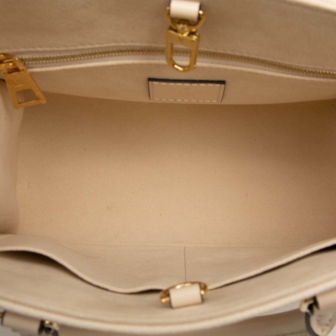 Onthego PM Monogram Empreinte Beige
