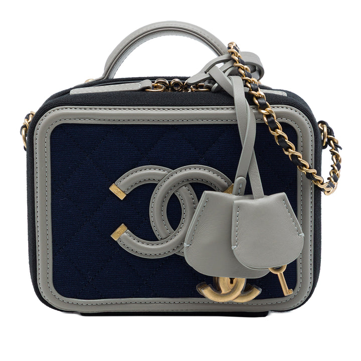 Chanel Tricolore Jersey CC Filigree Vanity Petit Bleu – vue principale – GABY PARIS