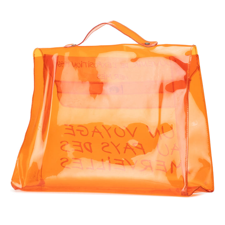 Vinyl Souvenir De L Exposition Kelly Handbag Orange - Gaby Paris