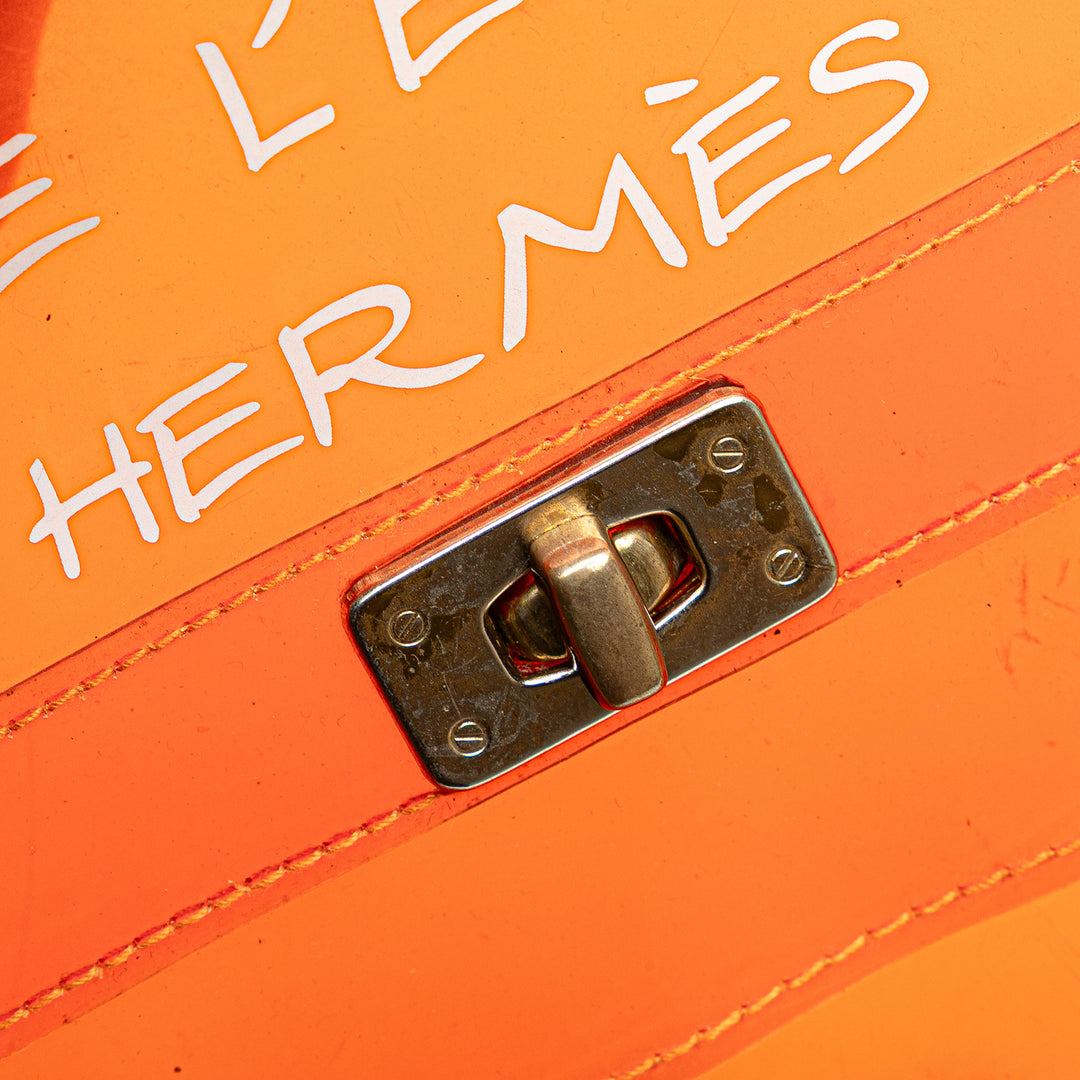 Vinyl Souvenir De L Exposition Kelly Handbag Orange - Gaby Paris
