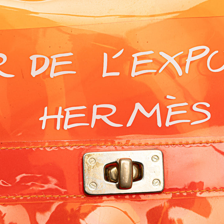 Vinyl Souvenir De L Exposition Kelly Handbag Orange - Gaby Paris