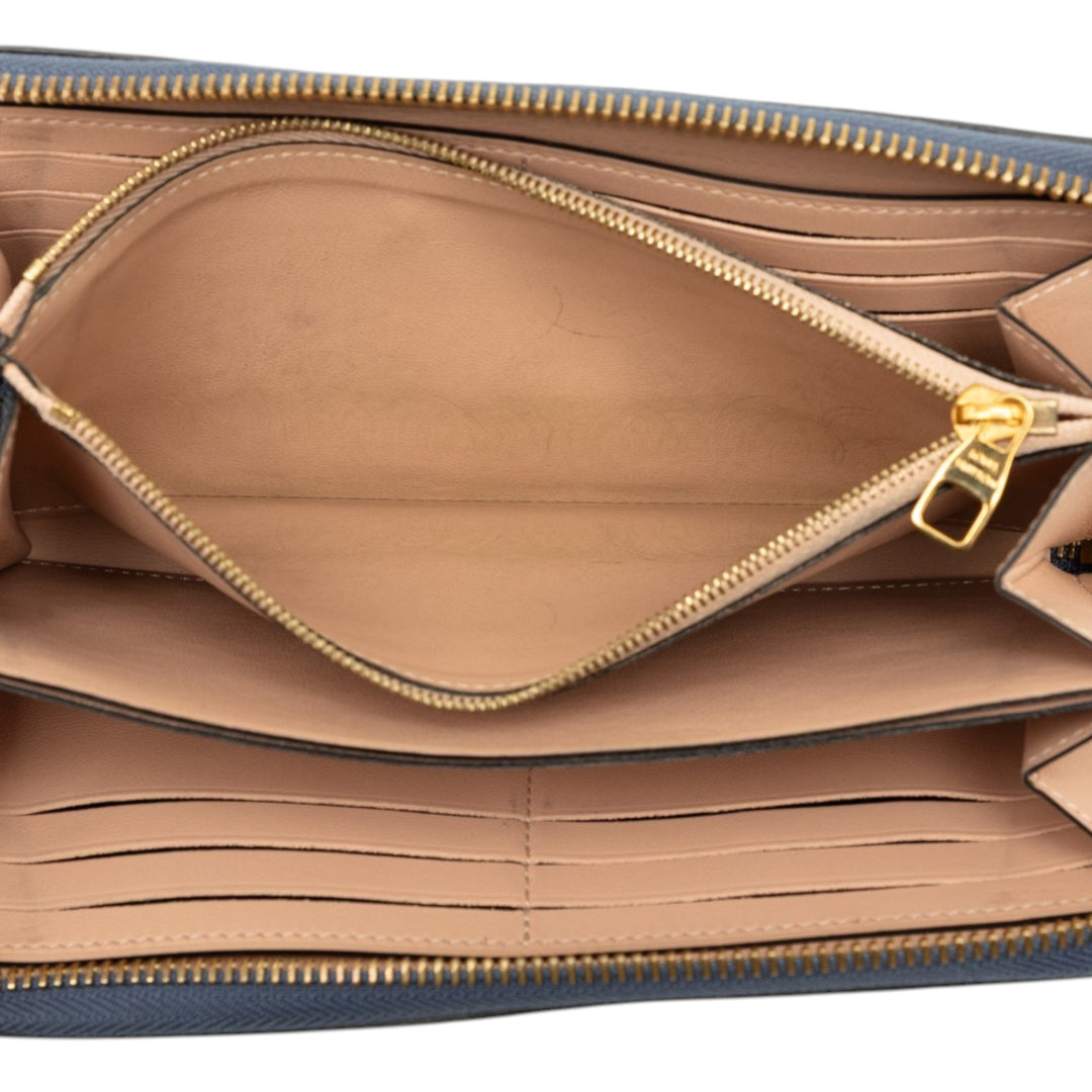 Louis Vuitton Taurillon Portefeuille Comet Portefeuille long