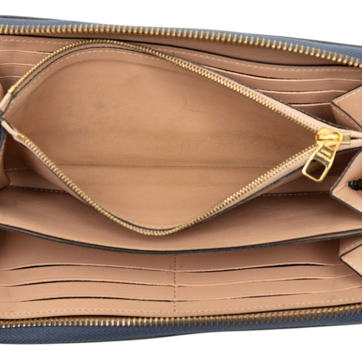 Louis Vuitton Taurillon Portefeuille Comet Portefeuille long