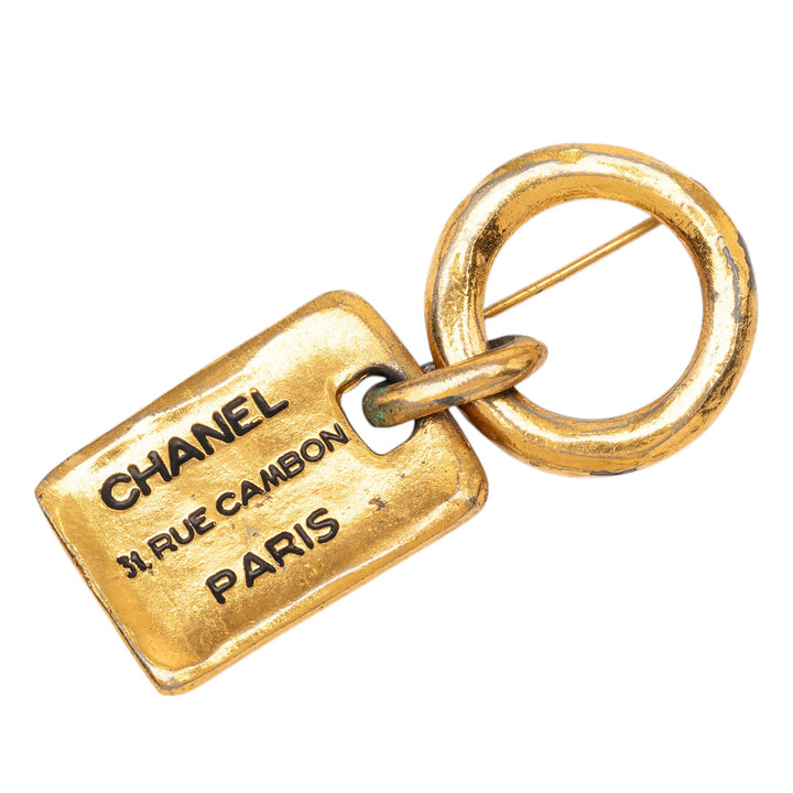 Chanel plaqué Rue Cambon Tag Broche Métal