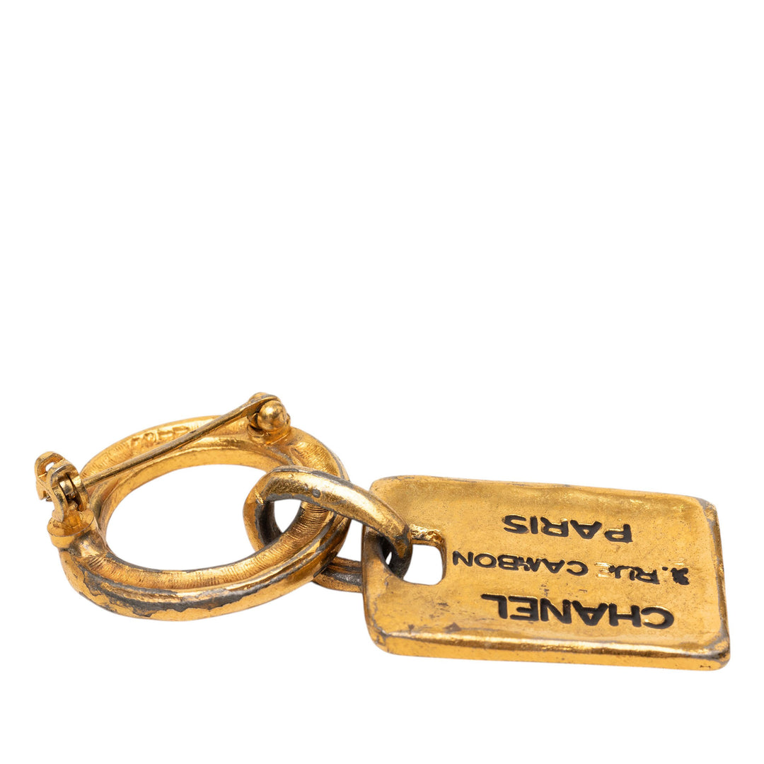 Chanel plaqué Rue Cambon Tag Broche Métal
