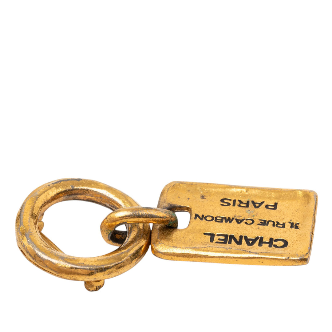 Chanel plaqué Rue Cambon Tag Broche Métal