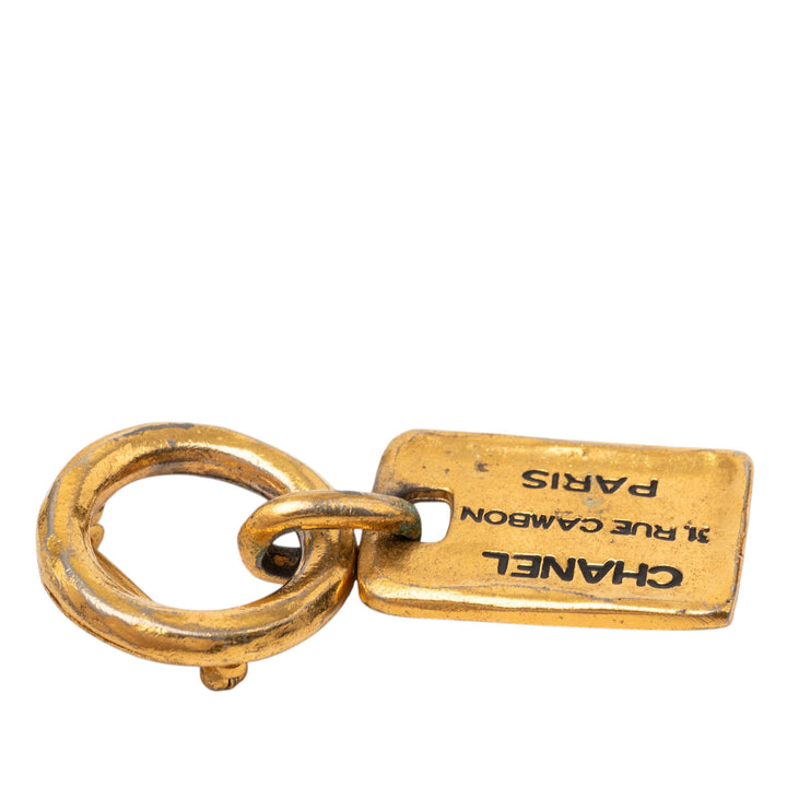 Chanel plaqué Rue Cambon Tag Broche Métal