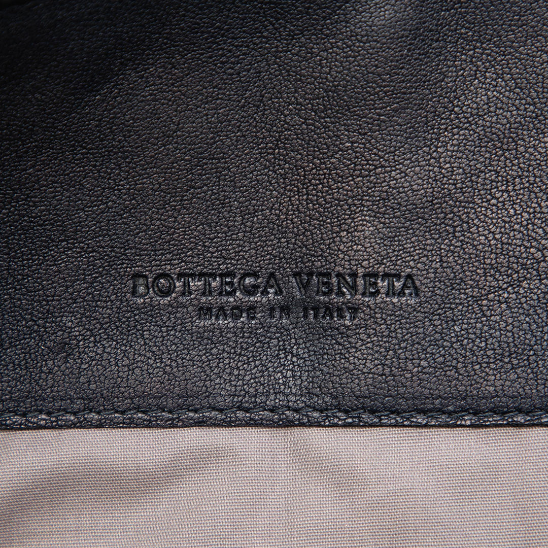 Tricolore Intrecciato Nappaleder-Pochette Schwarz