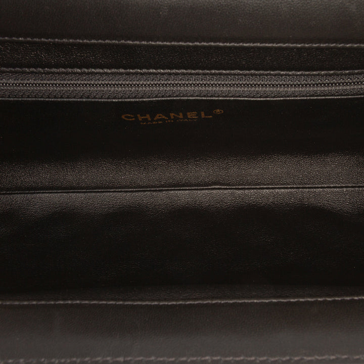 Chanel CC Quilted Cuir d’agneau Frame Pochette Noir