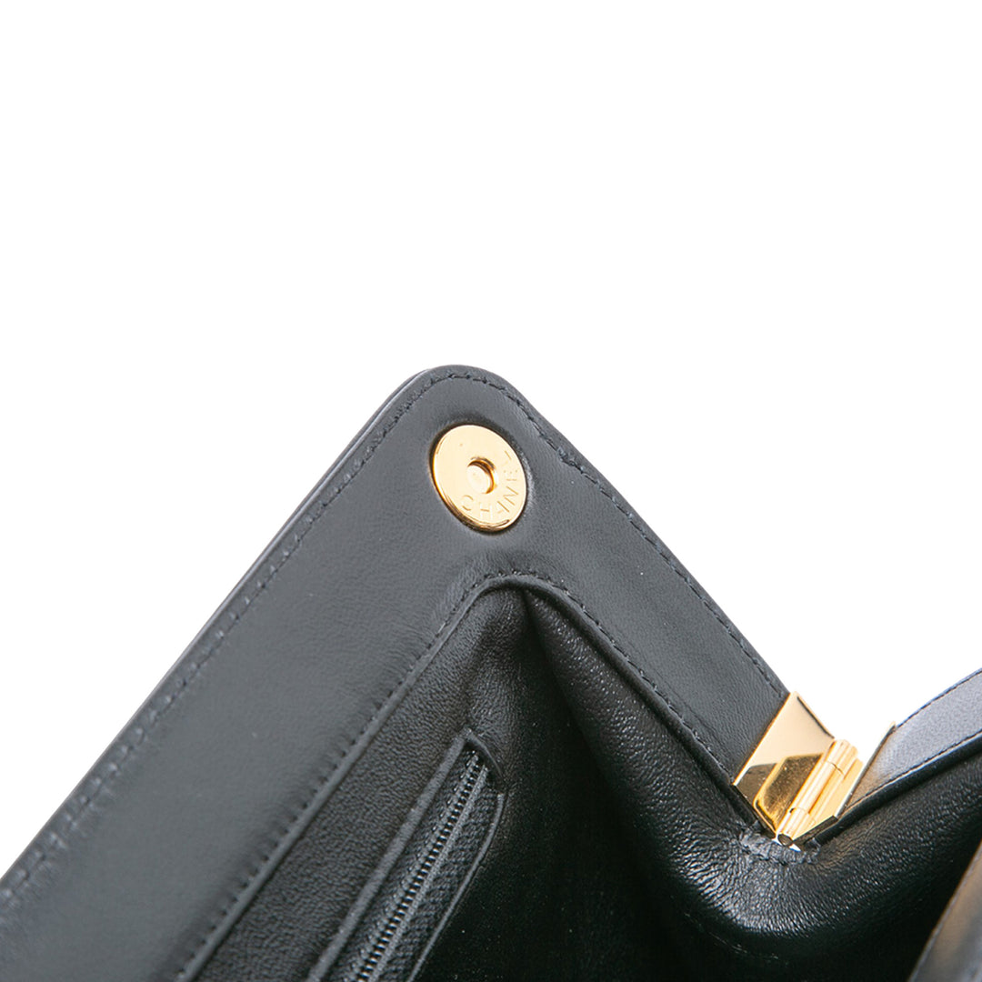 Chanel CC Quilted Cuir d’agneau Frame Pochette Noir
