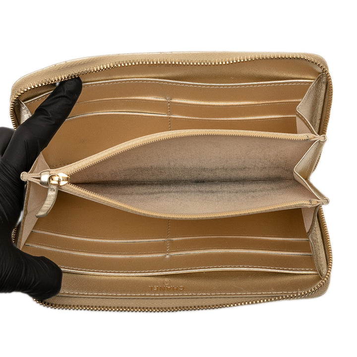 Chanel Quilted Métallisé Cuir d’agneau Zip Around Long Wallet Doré – GABY PARIS Authentique