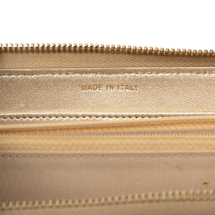 Chanel Quilted Métallisé Cuir d’agneau Zip Around Long Wallet Doré – GABY PARIS Authentique