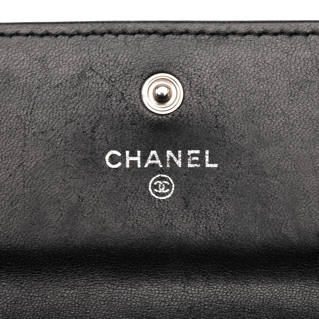 Chanel CC Embossed Cuir de veau Camellia Flap Wallet Noir – GABY PARIS Authentique