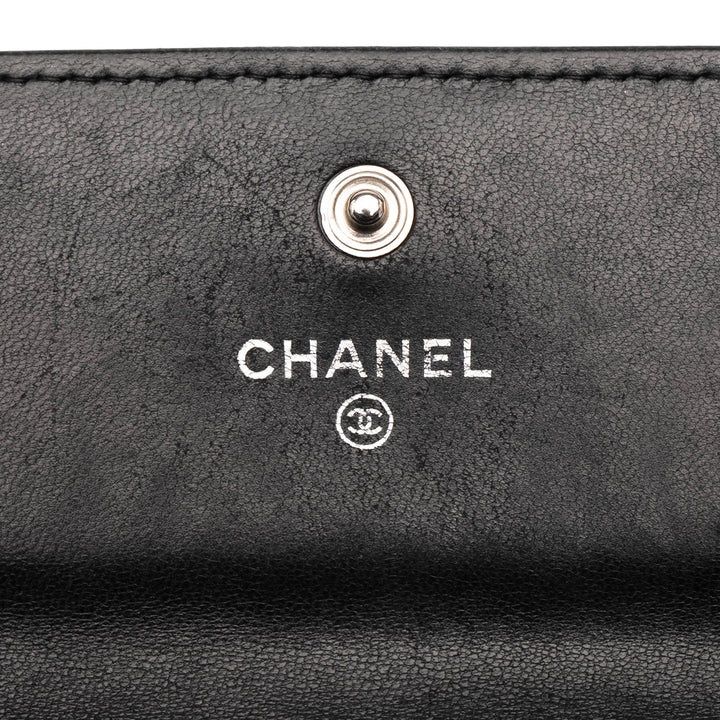 Chanel CC Embossed Cuir de veau Camellia Flap Wallet Noir – GABY PARIS Authentique