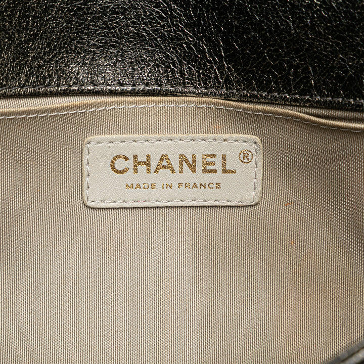 Chanel Old Medium Cracked Métallisé Cuir de veau Boy Flap Noir – GABY PARIS Authentique