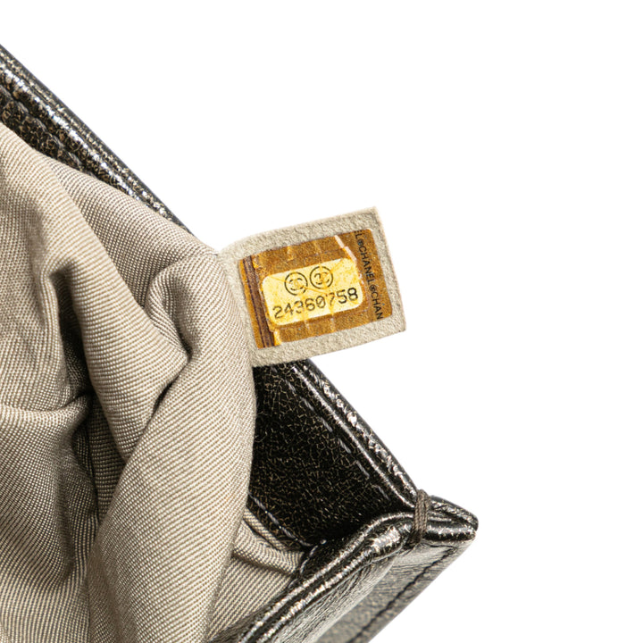Chanel Old Medium Cracked Métallisé Cuir de veau Boy Flap Noir – GABY PARIS Authentique