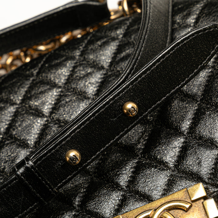 Chanel Old Medium Cracked Métallisé Cuir de veau Boy Flap Noir – GABY PARIS Authentique