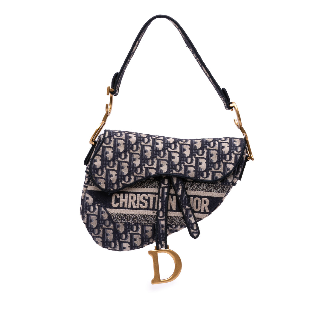 Oblique Embroidered Canvas Saddle Bag Blue - Gaby Paris