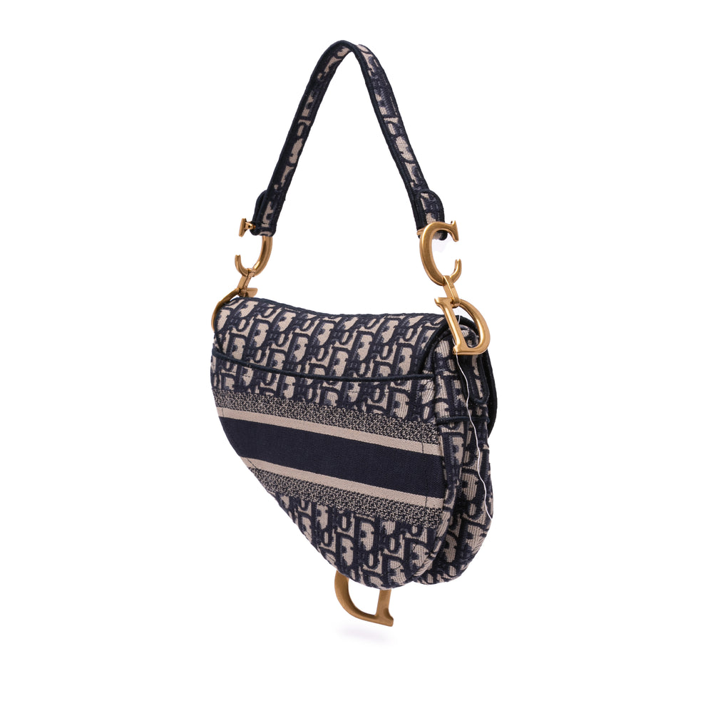 Oblique Embroidered Canvas Saddle Bag Blue - Gaby Paris