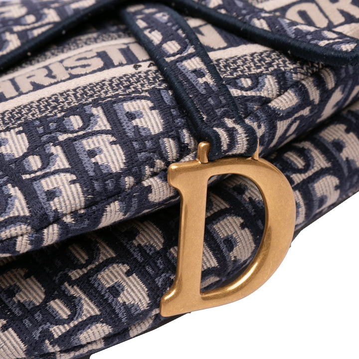 Oblique Embroidered Canvas Saddle Bag Blue - Gaby Paris