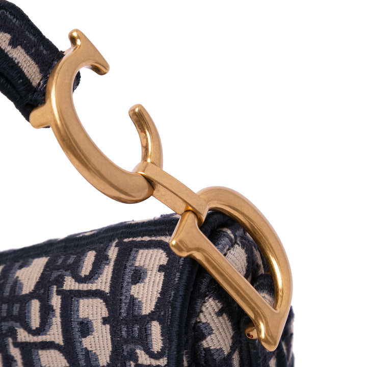 Oblique Embroidered Canvas Saddle Bag Blue - Gaby Paris