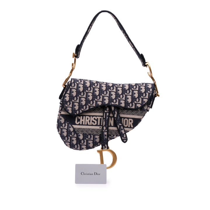 Oblique Embroidered Canvas Saddle Bag Blue - Gaby Paris